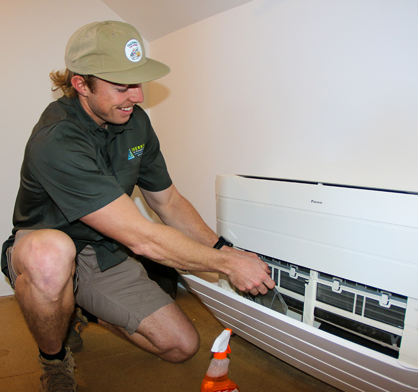 Man Repairing Air Condition — Air Conditioning Solutions In Tweed Heads, NSW