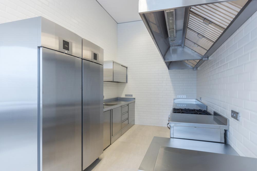 Double-door Refrigerator Inside A Big Kitchen