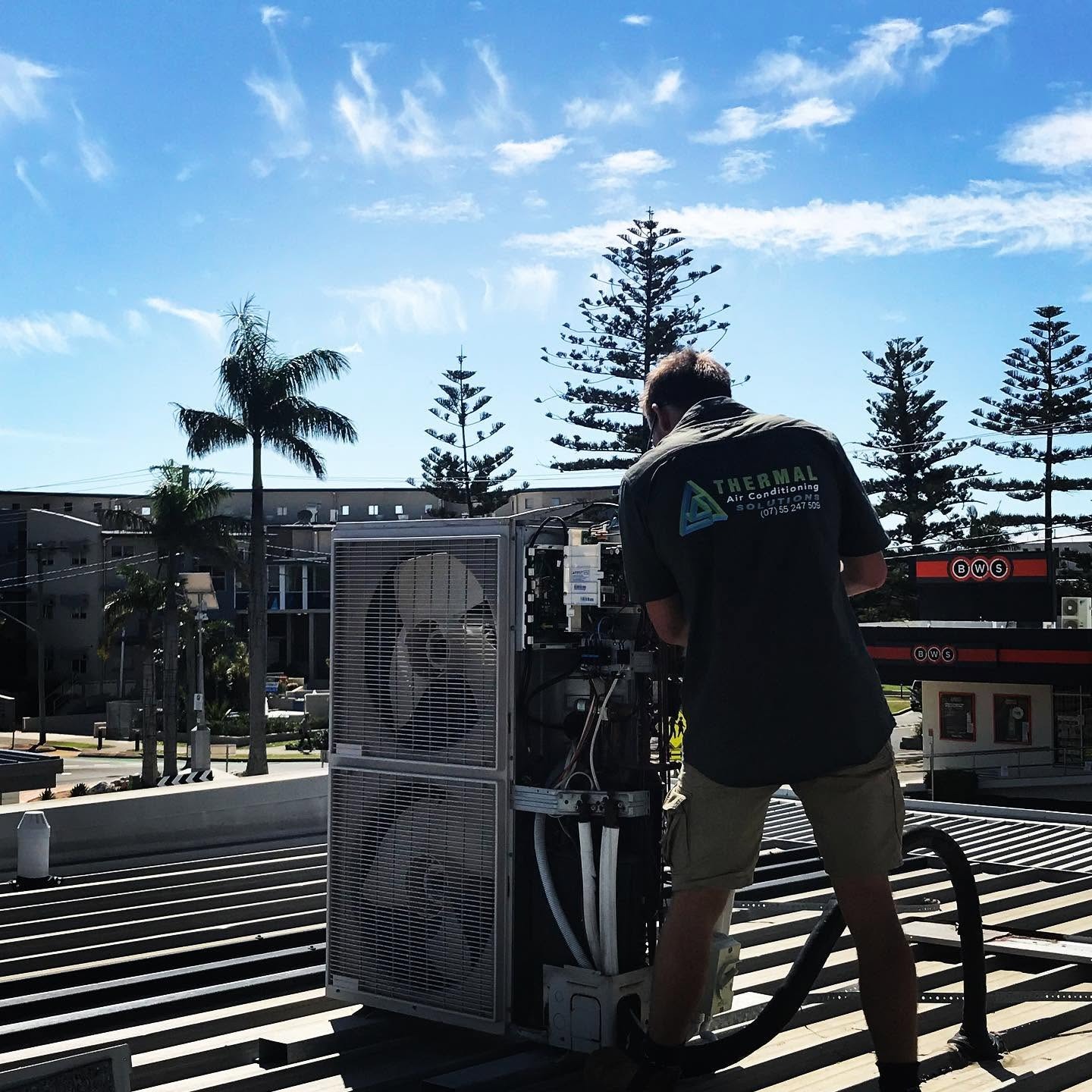 Worker Doing Air Conditioning Maintenance in Tweed Heads